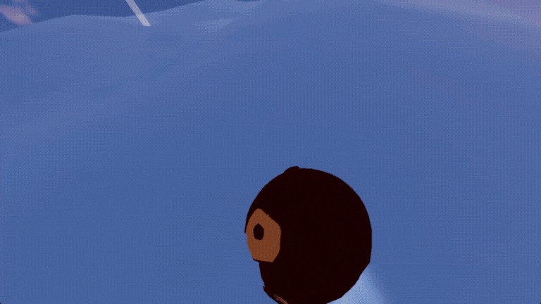 山を転がって駆け上がる筆者（クマ）の写真