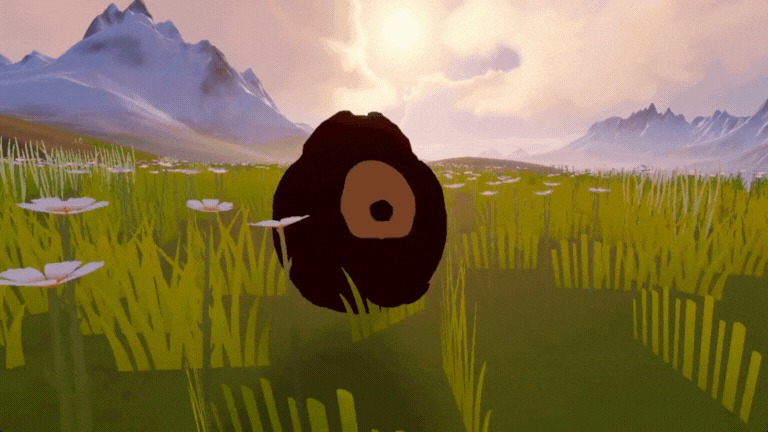 草原を転がる筆者（クマ）の写真