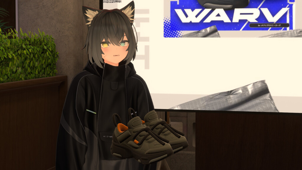 ぜれゔぃあさんと自身が制作したスニーカー「コージーベータ」の写真