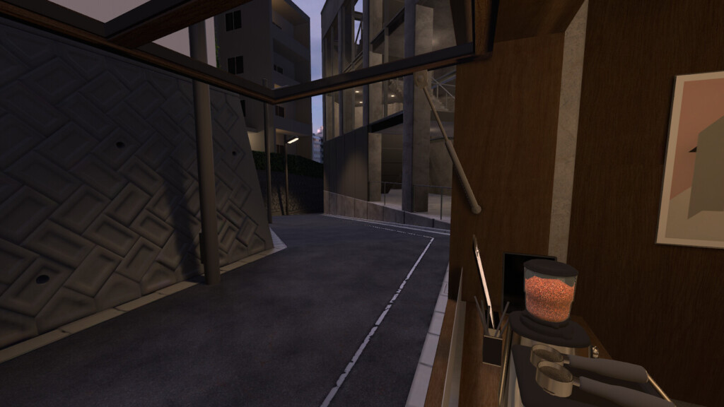 ショップ内のコーヒースタンドから見た坂道の景色の写真